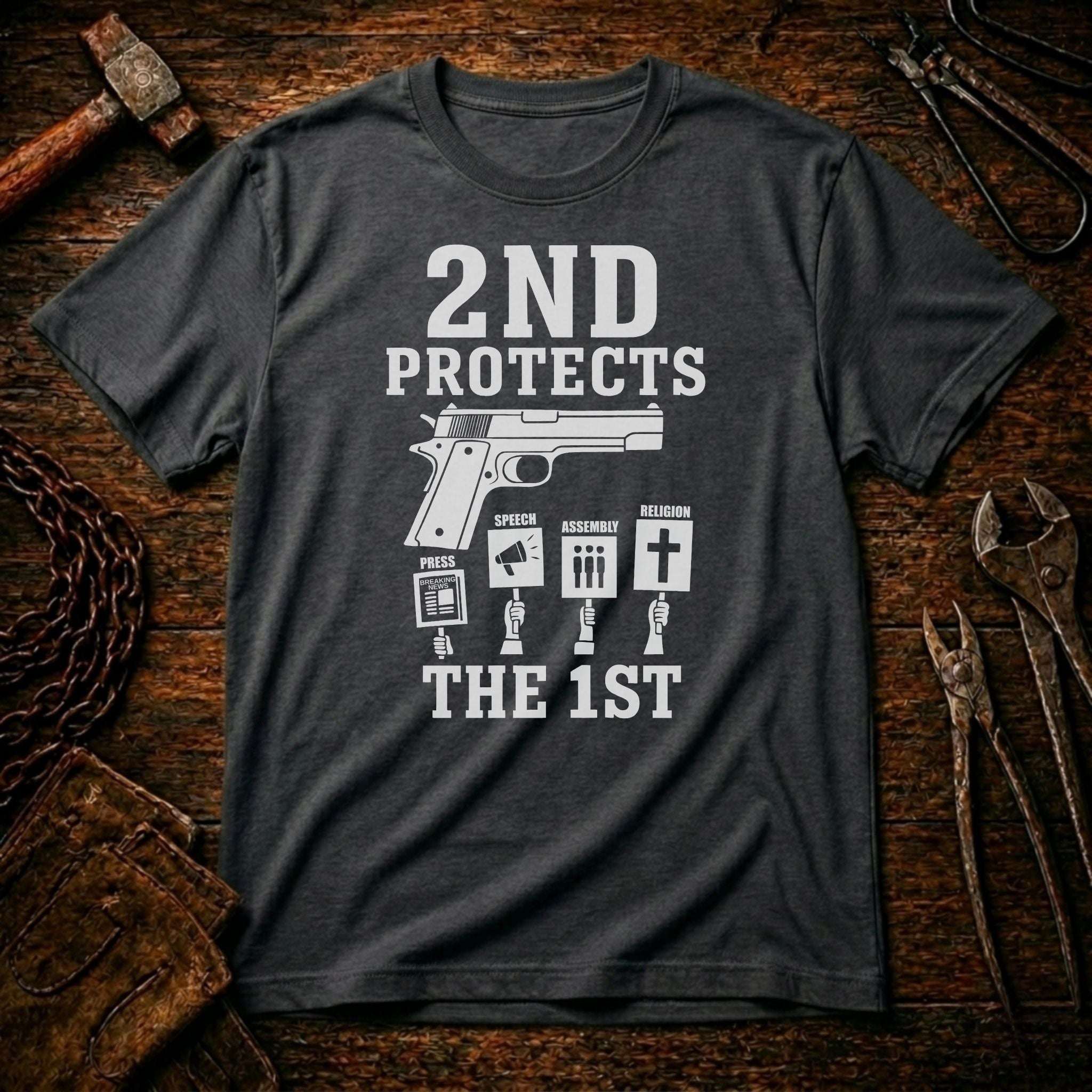 Gray t-shirt with a graphic and text on a wooden background